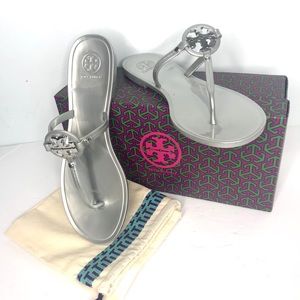 Tory Burch silver flip flops with logo